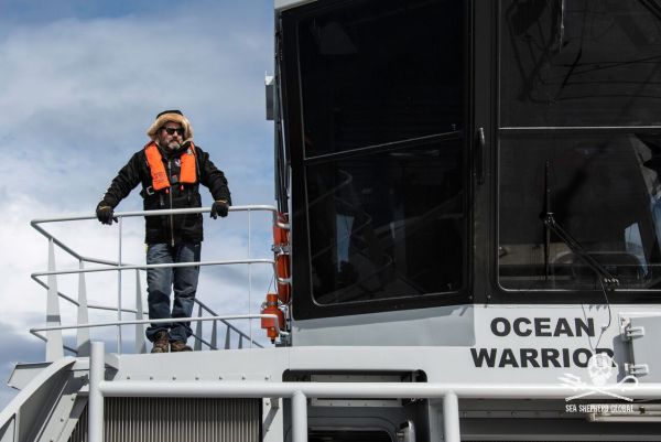 OW Cpt Meyerson watches over small boat crane operations