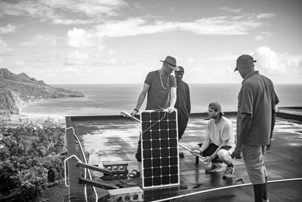 Tyler Norris of SoulR installed solar panels in Dominica with YachtAid Globals help