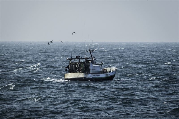 small French trawler and fisherman